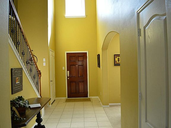 Enter to soaring ceilings.