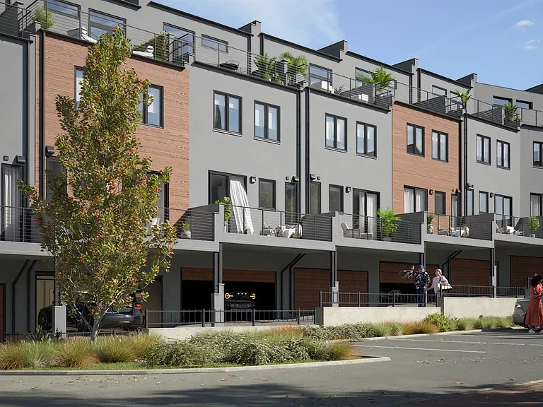 Rear of Townhomes and attached garage parking