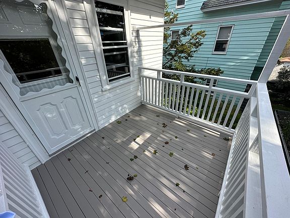 Private 2nd-floor balcony facing backyard