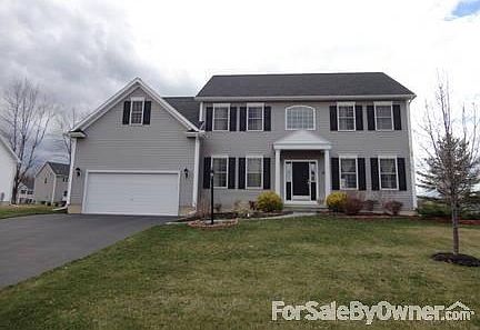 Bright Front view
						:
						Spacious Colonial house, better than new.