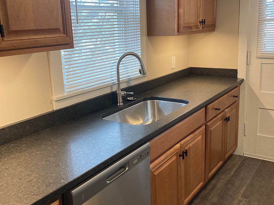 Kitchen new flooring, new sink faucet, new granite tops