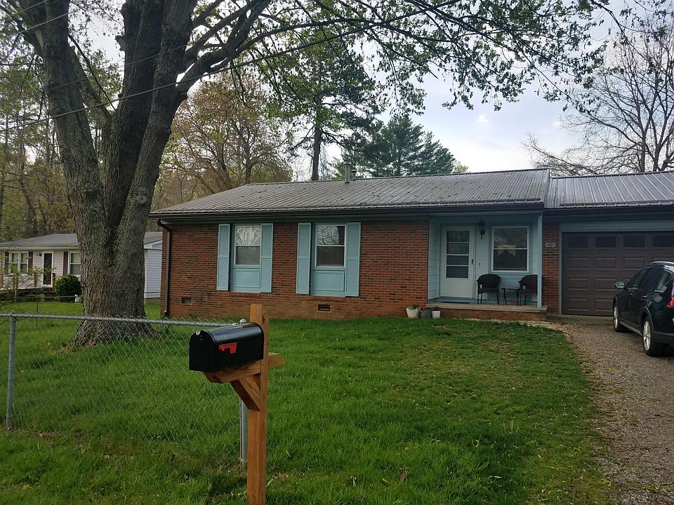New roof, new siding, off-street parking, big garage