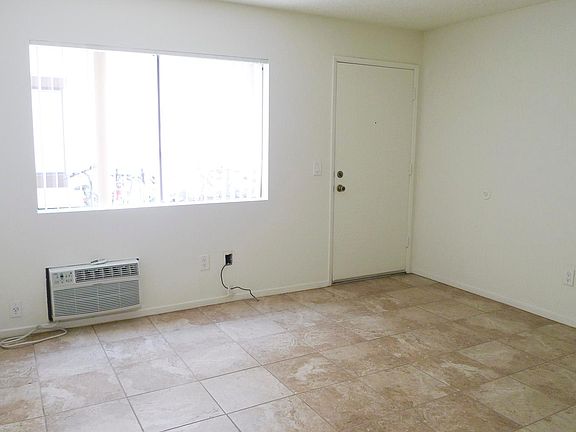Living Room; stock photos of similar unit.