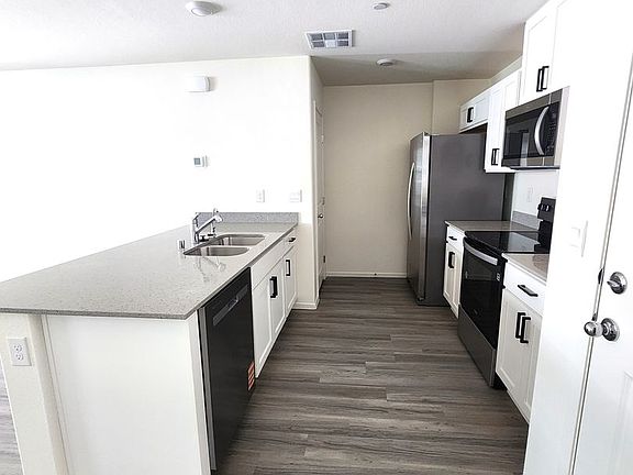 4th image of 9476 Peaceful River Ave