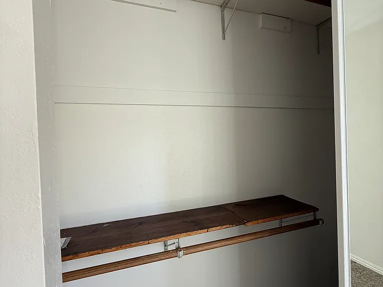 One of two closets in the Mater Bedroom