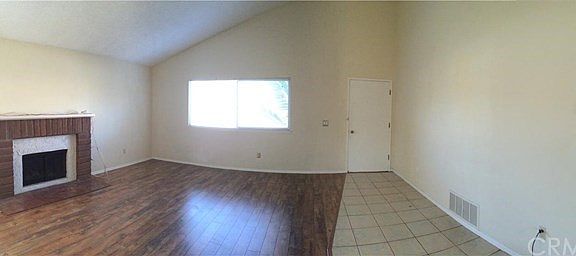 Huge living room, with new laminate flooring.