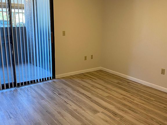 Master bedroom with sliding door to balcony