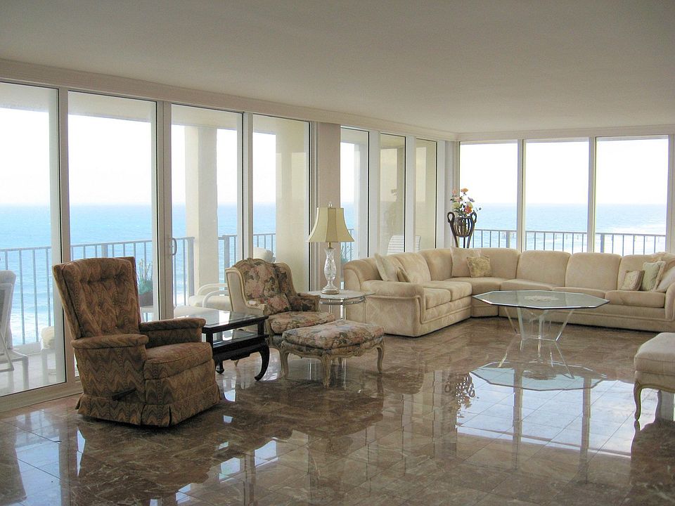 Large Living/Dining Area with direct South and East Ocean Exposure. 
