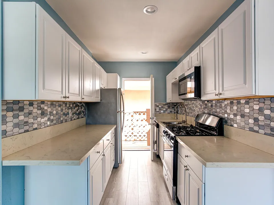 beautiful kitchen, real marble, backsplash, dishwasher, pantry cabinet