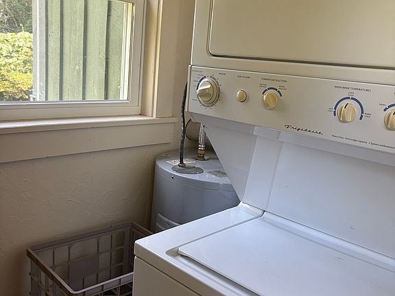 washer/dryer, water heater on left of entryway