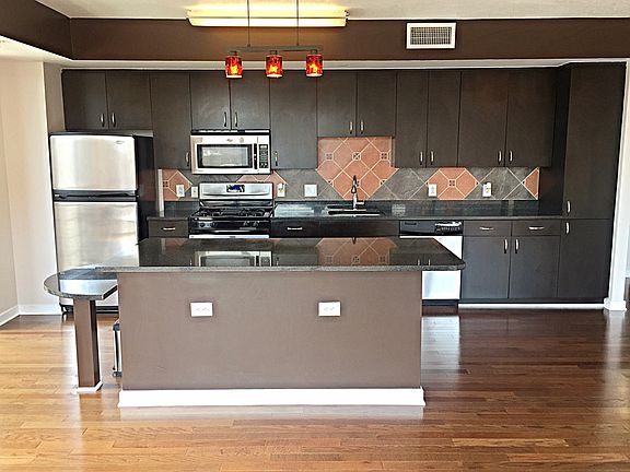 Large, eat-in kitchen with city views.