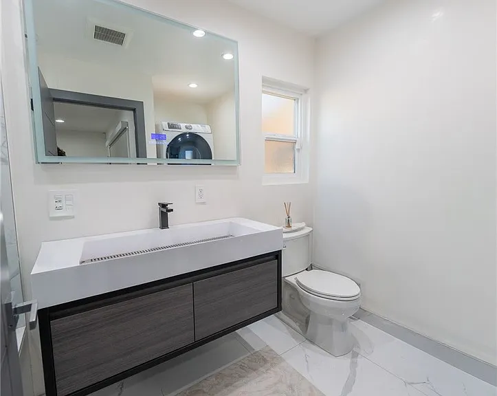 7719 Rhodes Ave — Photo 15