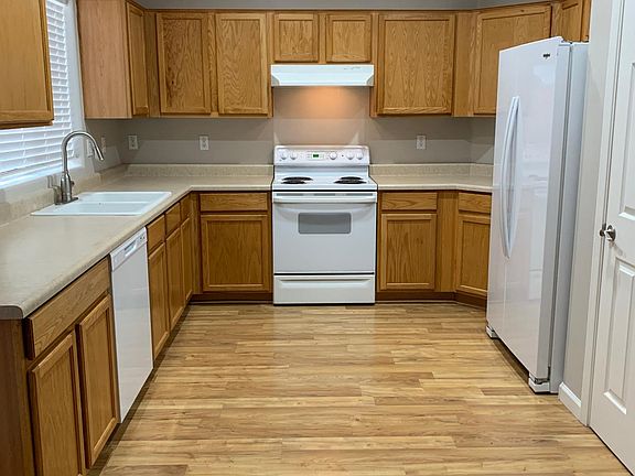 Kitchen with closet pantry.