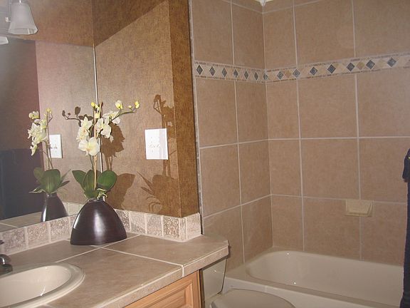 Beautiful brand new tile and stone bathrooms