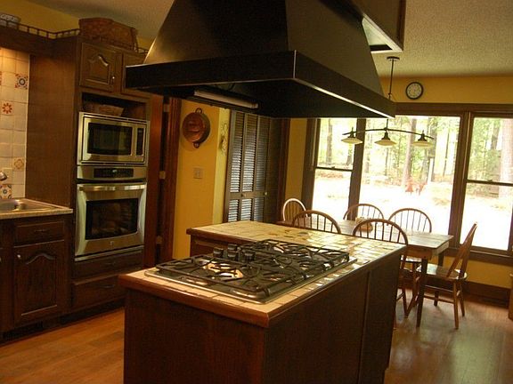 Kitchen with granite counters and new stainless appliances