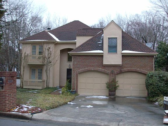 Street view, spacious two car garage, older pic. with snow