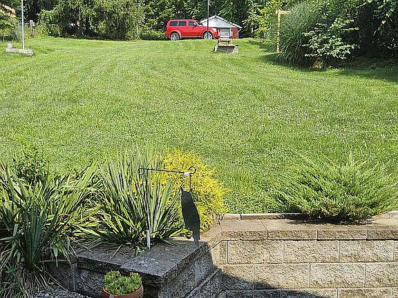 Patio, backyard and garage.