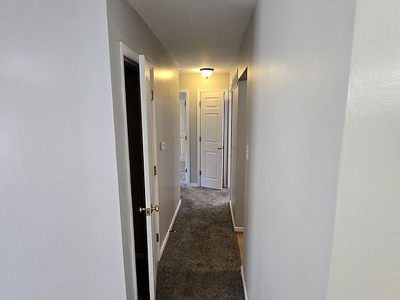 Hallway to bedrooms and bathrooms