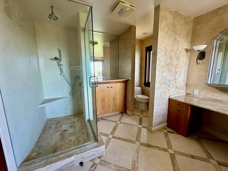 Plenty of storage and bathroom task areas.