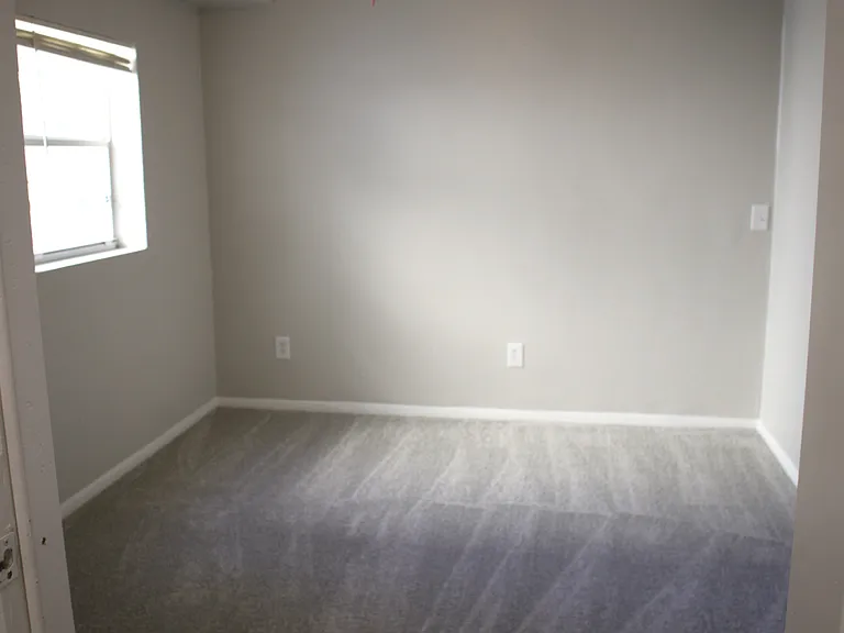 4th Bedroom/Bonus Room in Fully enclosed one car garage space.