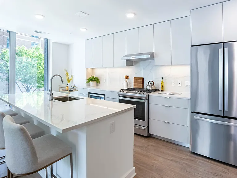 Kitchen with Stainless Steel Appliances and Quartz Countertops