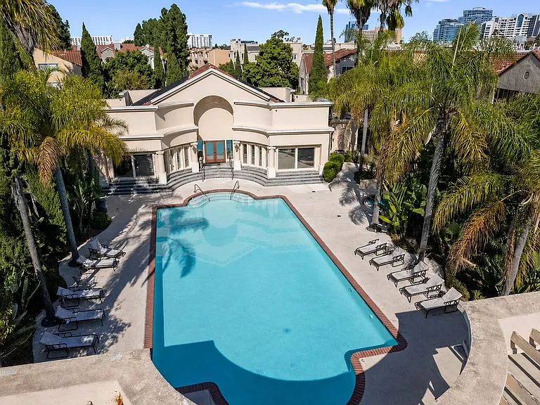 Pool and fitness center - there is also a separate jacuzzi hidden behind the trees on the right