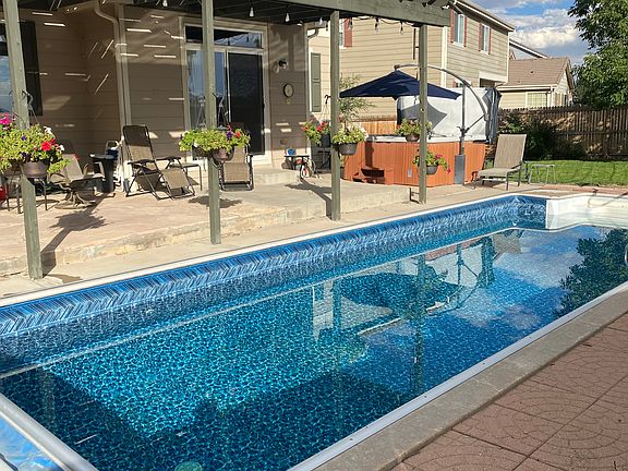 Pool and pergola entertaining and relaxing are