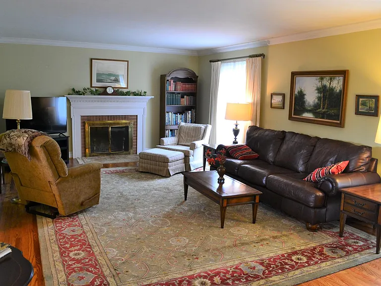Living room with flat screen and 
Roku