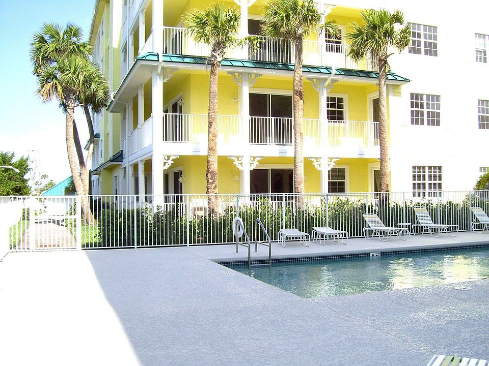 First Floor corner condo (built 2007)Walk across to Beach