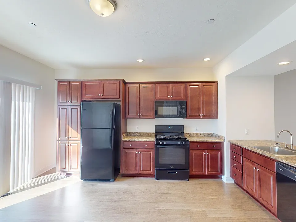 Large Kitchen Area with Island and Outside Patio
