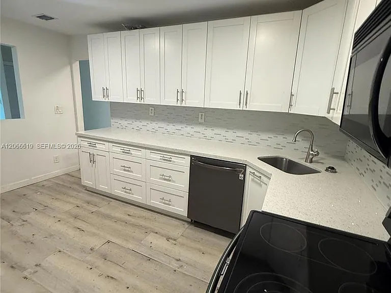 2910 NW 6th Ct — Photo 2