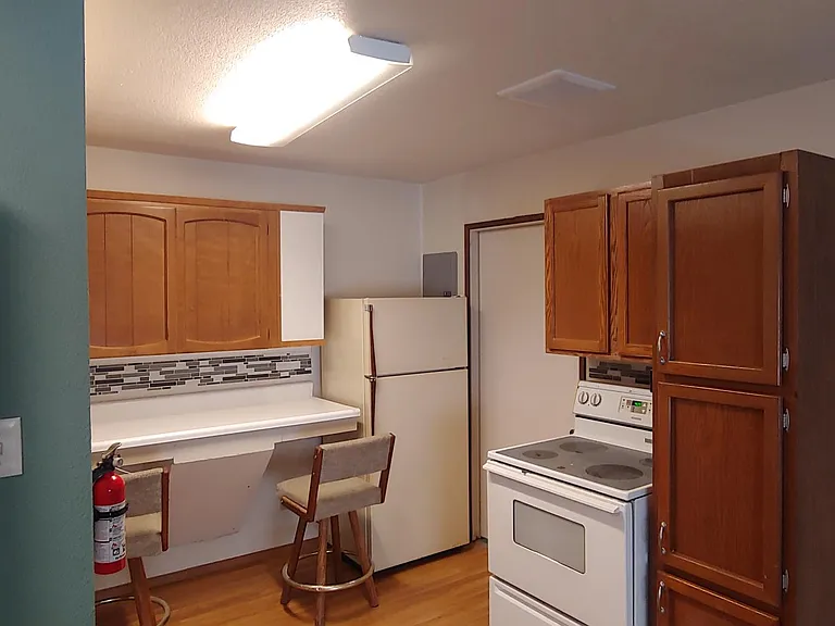 the kitchen counter was replaced with the black top