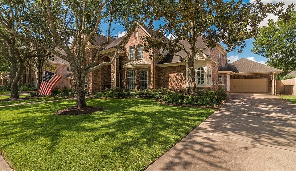 Welcome home! This charming, tree-shaded five bedroom home is located in Bay Oaks