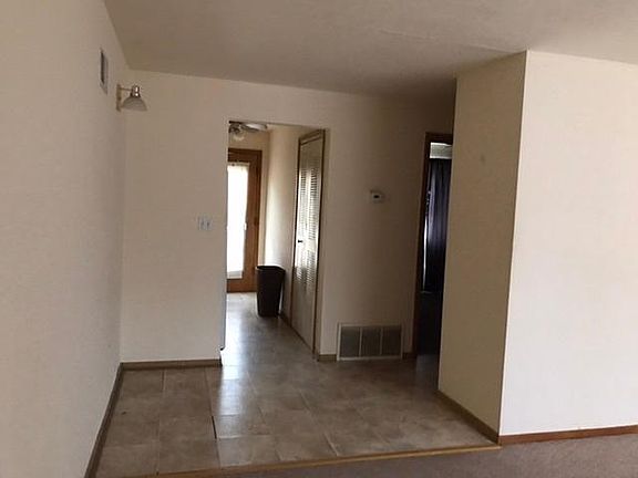 From living room looking to dinette area and kitchen