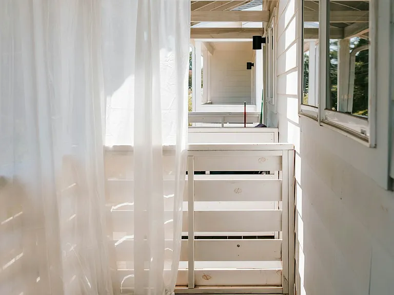Curtains fluttering, sunlight streaming, and your relaxation officially starts here.