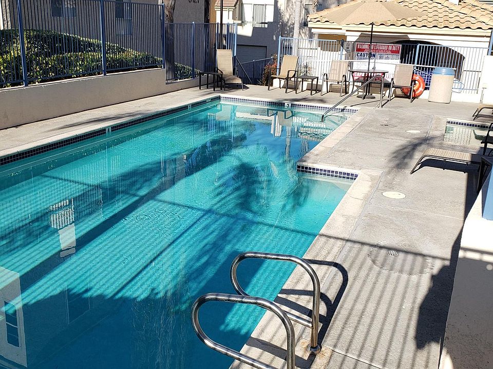 Community pool steps away