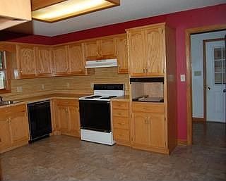 Kitchen with Blonde Oak Cabinets