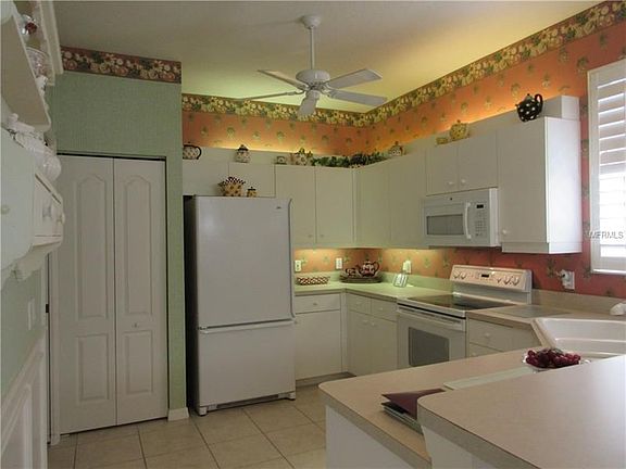 Closet Pantry.  Plant Shelves with Lighting in Kitchen.