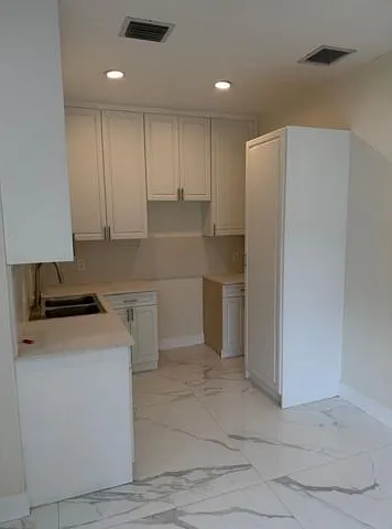 6410 NW Miami Ct — Photo 11
