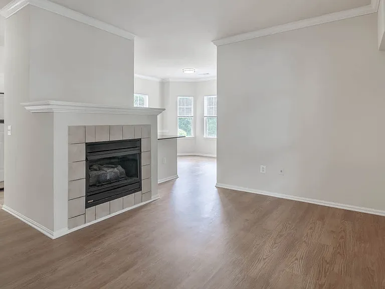 Living Room with Fireplace and Hard Surface Flooring
