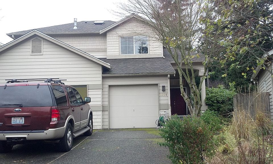 Front View,  3 car garage