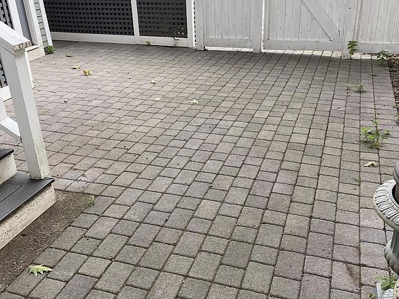 Fenced-in, low maintenance back yard.