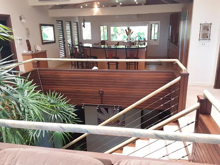 Stairway down to Ground Floor of House and Main Kitchen in background