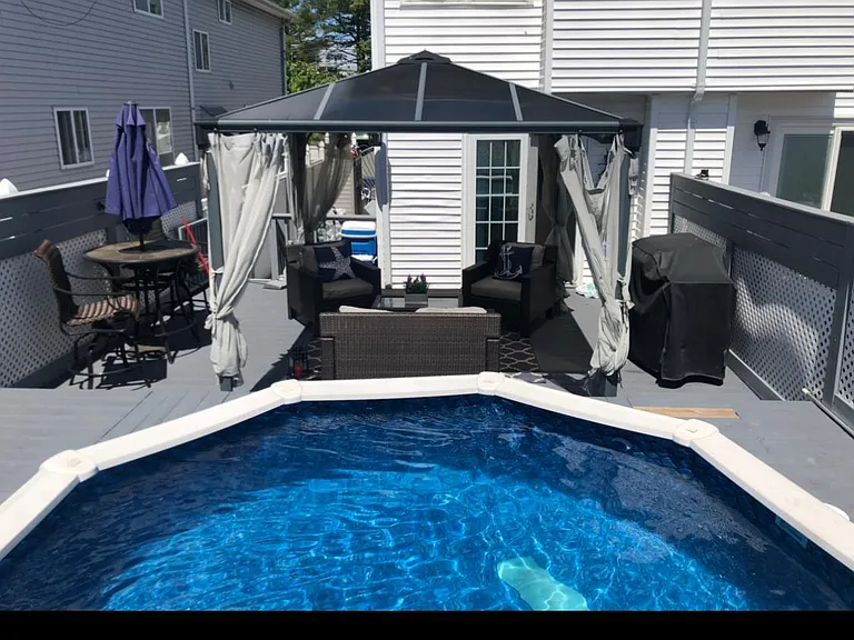 Backyard with pool wood deck & gazebo