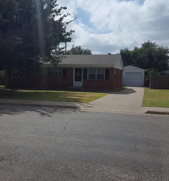 Front of house and detached garage