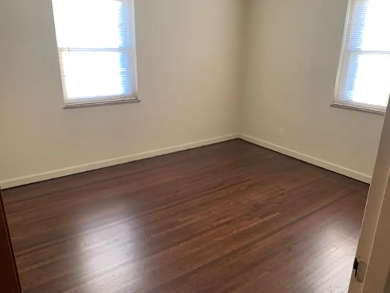 Bedroom with hardwood floors