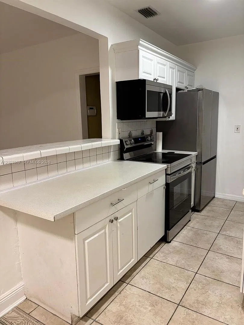 1758 NE 177th Street 1758, North Miami Beach, FL 33162 - 1510 — Photo 2