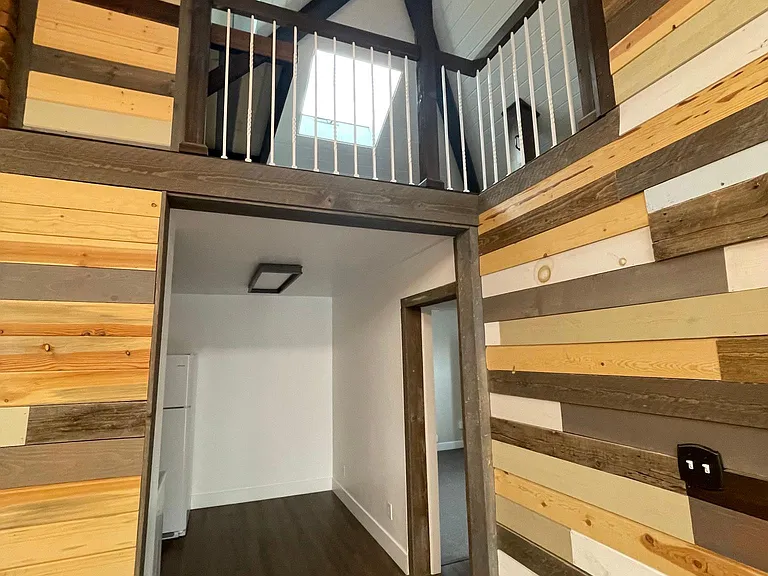 View of the sky-lit loft from the living room