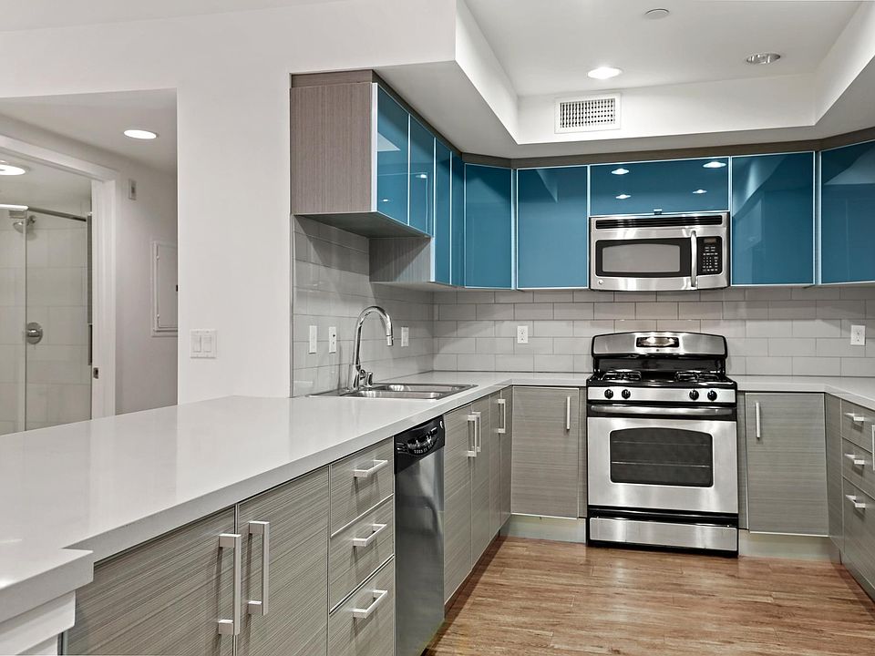 Full-Size Kitchen with Ample Cabinet Storage and Energy-Efficient Appliances