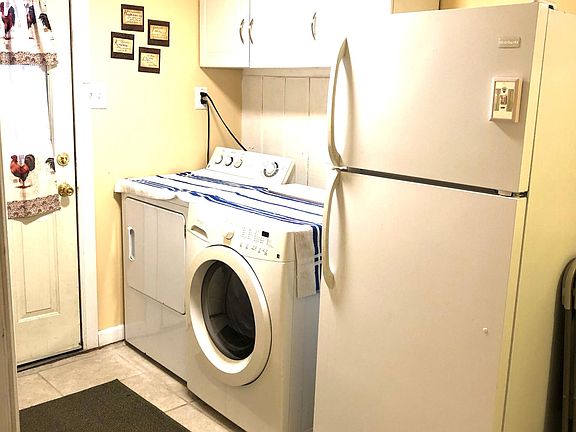 Laundry room with storage